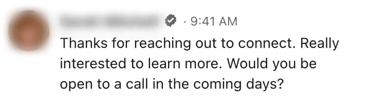 A prospect's reply on LinkedIn agreeing to talk, name blurred.